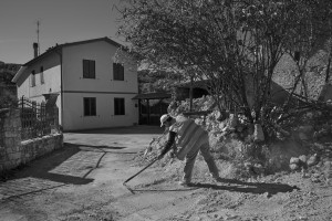 NORCIA, ITALY, NOVEMBER 1: A man cleans the ground from debris in Savelli, near Norcia, Italy, on November 1, 2016. A 6.5 magnitude earthquake hit central Italy on October 30, 2016.