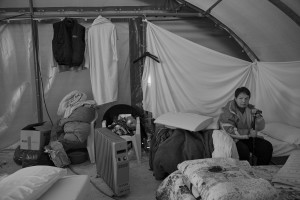 NORCIA, ITALY, NOVEMBER 2: A woman is seen inside a tent, in a camp set in Ancarano, near Norcia, Italy, on November 2, 2016. A 6.5 magnitude earthquake hit central Italy on October 30, 2016.