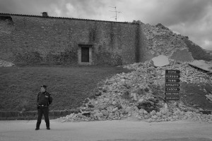 NORCIA, ITALY, NOVEMBER 2: A policeman patrols the partially collapsed Saint Anthony church in Norcia, Italy, on November 2, 2016. A 6.5 magnitude earthquake hit central Italy on October 30, 2016.