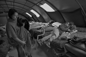 NORCIA, ITALY, NOVEMBER 2: A family is seen inside a tent, in a camp set in Ancarano, near Norcia, Italy, on November 2, 2016. A 6.5 magnitude earthquake hit central Italy on October 30, 2016.