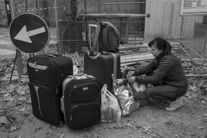 NORCIA, ITALY, NOVEMBER 2: A woman is seen near her belongings outside the ancient city of Norcia, in Italy, on November 2, 2016. A 6.5 magnitude earthquake hit central Italy on October 30, 2016.