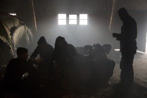 Migrants rest inside an abandoned warehouse in Belgrade, Serbia on February 3, 2017. Hundreds of migrants have been sleeping in freezing conditions in downtown Belgrade looking for ways to cross the heavily guarded EU borders.