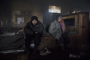 Migrants rest inside an abandoned warehouse in Belgrade, Serbia on February 3, 2017. Hundreds of migrants have been sleeping in freezing conditions in downtown Belgrade looking for ways to cross the heavily guarded EU borders.