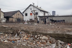 A migrant hangs laundry outside an abandoned warehouse where they are taking refuge, in Belgrade, Serbia on February 3, 2017. Hundreds of migrants have been sleeping in freezing conditions in central Belgrade looking for ways to cross the heavily guarded EU borders.