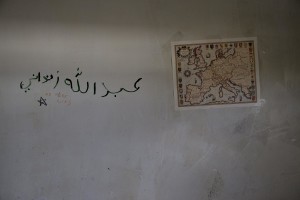 A map of Europe is attached on the wall of an abandoned warehouse in Belgrade, Serbia on February 5, 2017. Hundreds of migrants have been sleeping in freezing conditions in downtown Belgrade looking for ways to cross the heavily guarded EU borders.