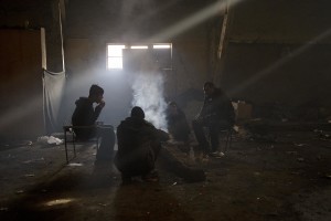 Migrants are seen inside an abandoned warehouse in Belgrade, Serbia on February 3, 2017. Hundreds of migrants have been sleeping in freezing conditions in downtown Belgrade looking for ways to cross the heavily guarded EU borders.
