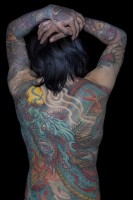 Tattoo artist Endless Sun from Taiwan is portrayed during the International Tattoo Fest in Naples, Italy on May 13, 2017. Tattooing fashion has exploded forcefully, thanks to television, social network and numerous tattoo festival organized worldwide.