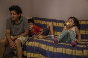 Angel Buendia from El Salvador and beneficiary of the protection systems for asylum seekers and refugees is seen in the house where he lives with his sons Miguel and Marcela in Petruro Irpino, southern Italy on June 14, 2017. Angel in his country was a policeman but had to run away with his family after he was threatened with death for having found information about drug trafficking. Petruro Irpino is an Italian small village with 367 inhabitants in the province of Avellino in Campania, which is claiming to be an efficient model of integration and where people of different religions and coming from different parts in the world peaceful live together.