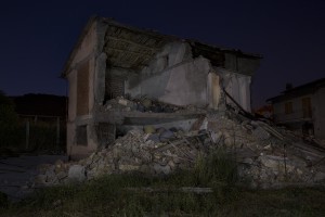 A collapsed building is seen almost one year after the earthquake in the village of Libertino, central Italy on August 1, 2017. Italy was struck by a powerful 6.2 magnitude earthquake in the night of August 24, 2016 which has killed at least 297 people and devastated dozens of houses in the Lazio village of Amatrice and other Amatrice fractions.