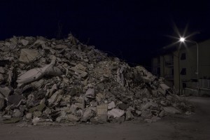 A collapsed building is seen almost one year after the earthquake in the village of Amatrice, central Italy on August 2, 2017. Italy was struck by a powerful 6.2 magnitude earthquake in the night of August 24, 2016 which has killed at least 297 people and devastated dozens of houses in the Lazio village of Amatrice and other Amatrice fractions.