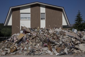 A collapsed building is seen almost one year after the earthquake in the village of Amatrice, central Italy on August 1, 2017. Italy was struck by a powerful 6.2 magnitude earthquake in the night of August 24, 2016 which has killed at least 297 people and devastated dozens of houses in the Lazio village of Amatrice and other Amatrice fractions.