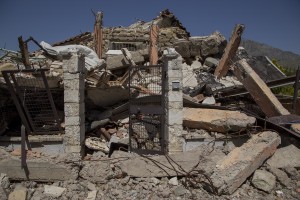 A collapsed building is seen almost one year after the earthquake in the village of Amatrice, central Italy on August 2, 2017. Italy was struck by a powerful 6.2 magnitude earthquake in the night of August 24, 2016 which has killed at least 297 people and devastated dozens of houses in the Lazio village of Amatrice and other Amatrice fractions.