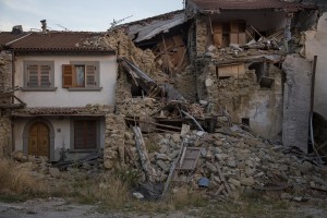 A collapsed building is seen almost one year after the earthquake in the village of Prato, central Italy on July 31, 2017. Italy was struck by a powerful 6.2 magnitude earthquake in the night of August 24, 2016 which has killed at least 297 people and devastated dozens of houses in the Lazio village of Amatrice and other Amatrice fractions.