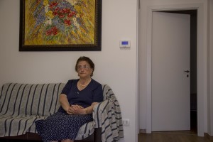 Concetta Renzi, 87 years old is portrayed inside the new house where she lives after her old one was destroyed by the earthquake of almost one year ago in the village of Amatrice, central Italy on August 1, 2017. Italy was struck by a powerful 6.2 magnitude earthquake in the night of August 24, 2016 which has killed at least 297 people and devastated dozens of houses in the Lazio village of Amatrice and other Amatrice fractions.