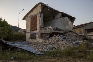 A collapsed building is seen almost one year after the earthquake in the village of Libertino, central Italy on August 1, 2017. Italy was struck by a powerful 6.2 magnitude earthquake in the night of August 24, 2016 which has killed at least 297 people and devastated dozens of houses in the Lazio village of Amatrice and other Amatrice fractions.