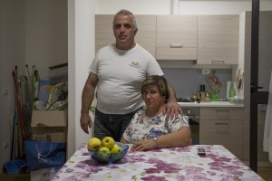 Silvio Puglia, 49 years old and Rita Casini, 49 years old are portrayed inside the new house where they live after their old one was destroyed by the earthquake of almost one year ago in the village of Amatrice, central Italy on August 2, 2017. Italy was struck by a powerful 6.2 magnitude earthquake in the night of August 24, 2016 which has killed at least 297 people and devastated dozens of houses in the Lazio village of Amatrice and other Amatrice fractions.