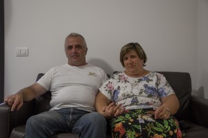 Silvio Puglia, 49 years old and Rita Casini, 49 years old are portrayed inside the new house where they live after their old one was destroyed by the earthquake of almost one year ago in the village of Amatrice, central Italy on August 2, 2017. Italy was struck by a powerful 6.2 magnitude earthquake in the night of August 24, 2016 which has killed at least 297 people and devastated dozens of houses in the Lazio village of Amatrice and other Amatrice fractions.