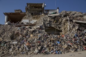 A collapsed building inside the red zone almost one year after the earthquake in the village of Amatrice, central Italy on August 1, 2017. Italy was struck by a powerful 6.2 magnitude earthquake in the night of August 24, 2016 which has killed at least 297 people and devastated dozens of houses in the Lazio village of Amatrice and other Amatrice fractions.