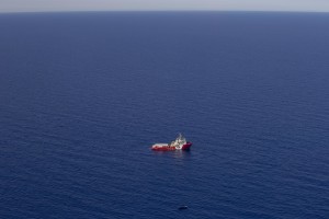 A picture taken from the moonbird aircraft of the German NGO Sea-Watch shows the migrants rescue operations of Vos Hestia ship run by NGO “Save the Children” in the Mediterranean sea on September 15, 2017.