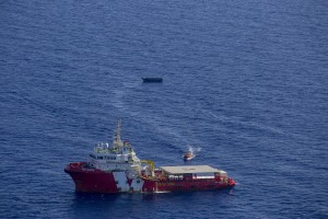 A picture taken from the moonbird aircraft of the German NGO Sea-Watch shows the migrants rescue operations of Vos Hestia ship run by NGO “Save the Children” in the Mediterranean sea on September 15, 2017.
