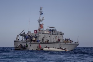 The Libyan Coast Guard tries to recover migrants from a rubber dinghy in the Mediterranean Sea on November 6, 2017. During a shipwreck, five people died, including a newborn child. According to the German NGO Sea-Watch, which has saved 58 migrants, the violent behavior of the Libyan coast guard caused the death of five persons. Alessio Paduano 