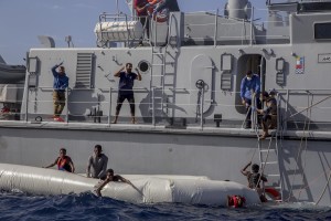 The Libyan Coast Guard tries to recover migrants from a rubber dinghy and invites violently and threateningly the German NGO Sea-Watch – who was performing rescue operations – to go away in the Mediterranean Sea on November 6, 2017. During a shipwreck, five people died, including a newborn child. According to the German NGO Sea-Watch, which has saved 58 migrants, the violent behavior of the Libyan coast guard caused the death of five persons.