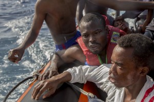 Migrants are rescued by members of German NGO Sea-Watch in the Mediterranean Sea on November 6, 2017. During a shipwreck, five people died, including a newborn child. According to the German NGO Sea-Watch, which has saved 58 migrants, the violent behavior of the Libyan coast guard caused the death of five persons. Alessio Paduano