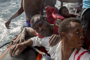 Migrants are rescued by members of German NGO Sea-Watch in the Mediterranean Sea on November 6, 2017. During a shipwreck, five people died, including a newborn child. According to the German NGO Sea-Watch, which has saved 58 migrants, the violent behavior of the Libyan coast guard caused the death of five persons.