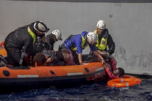 Migrants are rescued by members of German NGO Sea-Watch in the Mediterranean Sea on November 6, 2017. During a shipwreck, five people died, including a newborn child. According to the German NGO Sea-Watch, which has saved 58 migrants, the violent behavior of the Libyan coast guard caused the death of five persons. Alessio Paduano