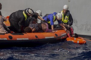 Migrants are rescued by members of German NGO Sea-Watch in the Mediterranean Sea on November 6, 2017. During a shipwreck, five people died, including a newborn child. According to the German NGO Sea-Watch, which has saved 58 migrants, the violent behavior of the Libyan coast guard caused the death of five persons.