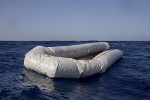 A rubber dinghy is seen in the Mediterranean Sea on November 6, 2017. During a shipwreck, five people died, including a newborn child. According to the German NGO Sea-Watch, which has saved 58 migrants, the violent behavior of the Libyan coast guard caused the death of five persons.