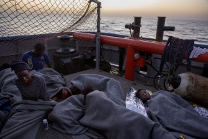 Migrants are seen on board of German NGO Sea-Watch ship after their rescue in the Mediterranean Sea on November 6, 2017. During the shipwreck November 6,2017 five people died, including a newborn child. According to Sea-Watch, which has saved 58 migrants, the violent behavior of the Libyan coast guard caused the death of five persons. Sea-Watch is a non-governmental organisation founded on May, 19 2015 and is formally registered as a non-profit organisation in Berlin.