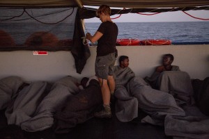 Migrants are seen on board of German NGO Sea-Watch ship after their rescue in the Mediterranean Sea on November 6, 2017. During the shipwreck November 6,2017 five people died, including a newborn child. According to Sea-Watch, which has saved 58 migrants, the violent behavior of the Libyan coast guard caused the death of five persons. Sea-Watch is a non-governmental organisation founded on May, 19 2015 and is formally registered as a non-profit organisation in Berlin.