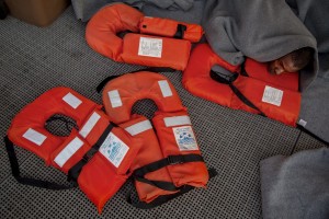 A migrant is seen on board of German NGO Sea-Watch ship after his rescue in the Mediterranean Sea on November 7, 2017. During the shipwreck November 6,2017 five people died, including a newborn child. According to Sea-Watch, which has saved 58 migrants, the violent behavior of the Libyan coast guard caused the death of five persons. Sea-Watch is a non-governmental organisation founded on May, 19 2015 and is formally registered as a non-profit organisation in Berlin.