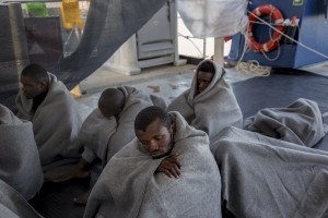Migrants are seen on board of German NGO Sea-Watch ship after their rescue in the Mediterranean Sea on November 8, 2017. During the shipwreck November 6,2017 five people died, including a newborn child. According to Sea-Watch, which has saved 58 migrants, the violent behavior of the Libyan coast guard caused the death of five persons. Sea-Watch is a non-governmental organisation founded on May, 19 2015 and is formally registered as a non-profit organisation in Berlin.