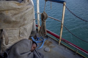 A migrant is seen on board of German NGO Sea-Watch ship after his rescue in the Mediterranean Sea on November 8, 2017. During the shipwreck November 6,2017 five people died, including a newborn child. According to Sea-Watch, which has saved 58 migrants, the violent behavior of the Libyan coast guard caused the death of five persons. Sea-Watch is a non-governmental organisation founded on May, 19 2015 and is formally registered as a non-profit organisation in Berlin.