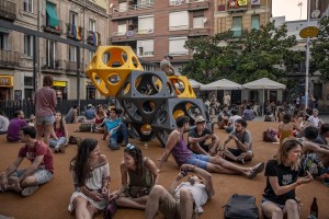 People are seen in Plaza del Sol, in Barcelona, Spain on July 8, 2018.