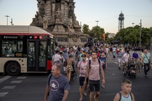 People walk in Plaza Colon in Barcelona, Spain on July 12, 2018.