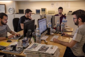 Journalists at work inside the editorial office of “Vilaweb” in the Raval district in Barcelona, Spain on July 12, 2018. “Vilaweb” is a Catalan-language web portal and daily news outlet founded in May 1995. The Raval is one of the most multicultural and colorful neighborhoods in the city and it hosts numerous artists and galleries.