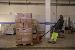 A man at work inside a store where canapa light is handled in Caivano, Southern Italy on September 26, 2018. According to the Italian law 242 approved in December 2016, the production and marketing of hemp in Italy is legal if cannabis has a content of THC (tetrahydrocannabinol, the active ingredient) which doesn’t exceed 0,6%.