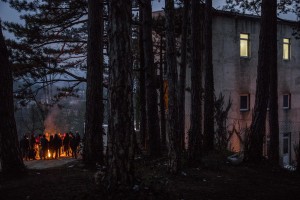 A group of migrants from Afghanistan and Pakistan gather around a fire to warm themselves in Bihać, Bosnia and Herzegovina on November 29, 2018.