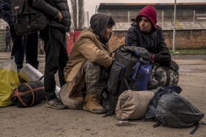 Migrants are seen outside an abandoned building where they took refuge in the outskirts of the Bosnian city of Bihać, Bosnia and Herzegovina on November 29, 2018.