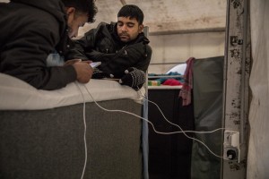 Migrants are seen inside a reception center in Velika Kladusa, Bosnia and Herzegovina on November 30, 2018.