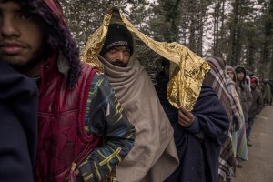 Afghans and Pakistanis migrants lined up during the food distribution near a park in Bihać, Bosnia and Herzegovina on November 28, 2018.