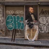 A mural realized by the French artist “Blase” is seen in a street of the historical center of Naples, in Italy on March 22, 2019.