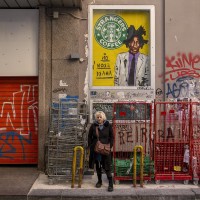 A portrait of the Neapolitan artist “Roxy in the box” near a work realized by her depicting the American writer and painter Jean-Michel Basquiat in Naples, Italy on March 22, 2019.