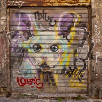 A mural of the Italian street artist “Walter Molli ” is seen in the alleys of the historical center of Naples, Italy on March 24, 2019.