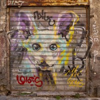 A mural of the Italian street artist “Walter Molli ” is seen in the alleys of the historical center of Naples, Italy on March 24, 2019.