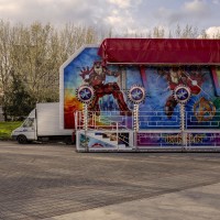 Carousel in the middle of Giovanni Paolo II square in Scampia district, in Naples, Italy on March 9, 2019.