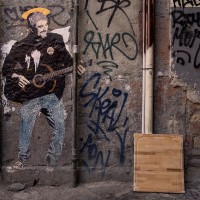 A stencil of the Italian street artist “TvBoy” depicting the Neapolitan singer Pino Daniele in the alleys of the historical center of Naples, in Italy on March 24, 2019.